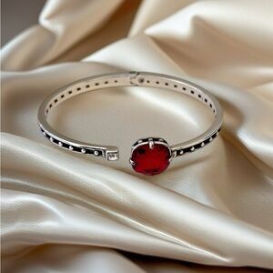 Brighton Lovable Hinged Bangle.  Hinged Bangle features two Swarovski stones.